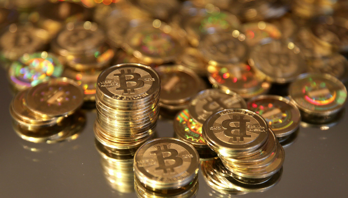 认可区块链前景？私募一哥王亚伟、巨人网络入股交易平台OKcoin